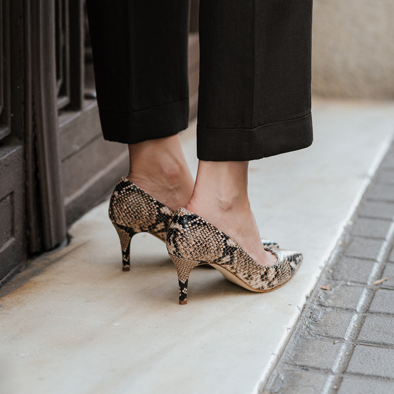 Python animal print stilettos with a very comfortable midi heel, perfect for all day wear.