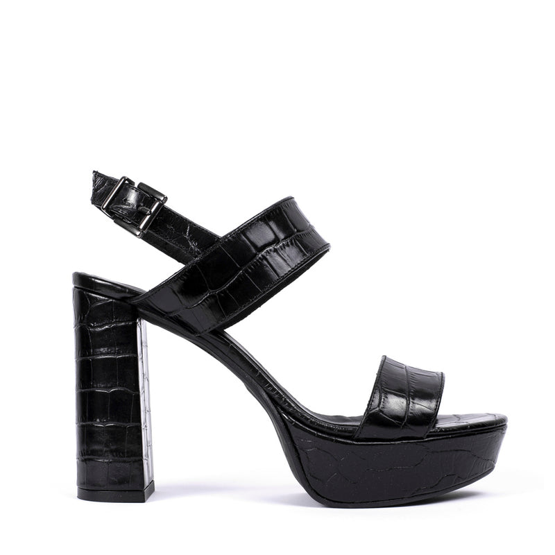 Chunky heel sandal with platform in black coco effect leather.