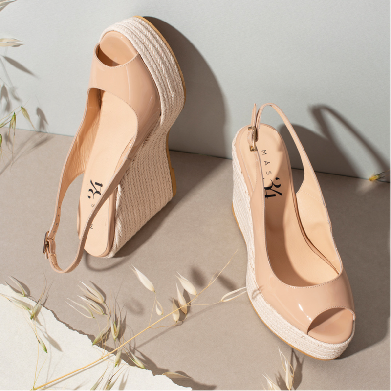 Elegant women's party wedges in nude patent leather