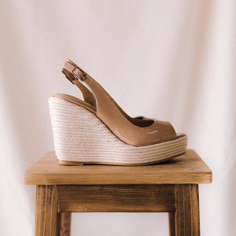 Nude patent leather bridal wedges