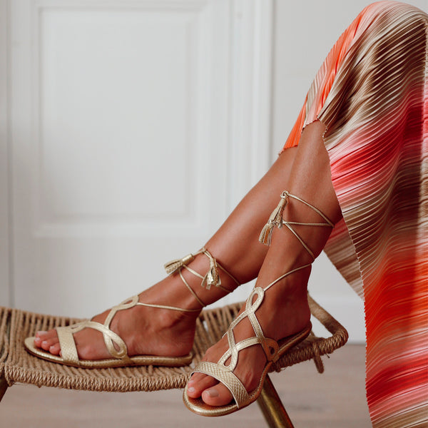 Golden women's summer sandal, comfortable and elegant