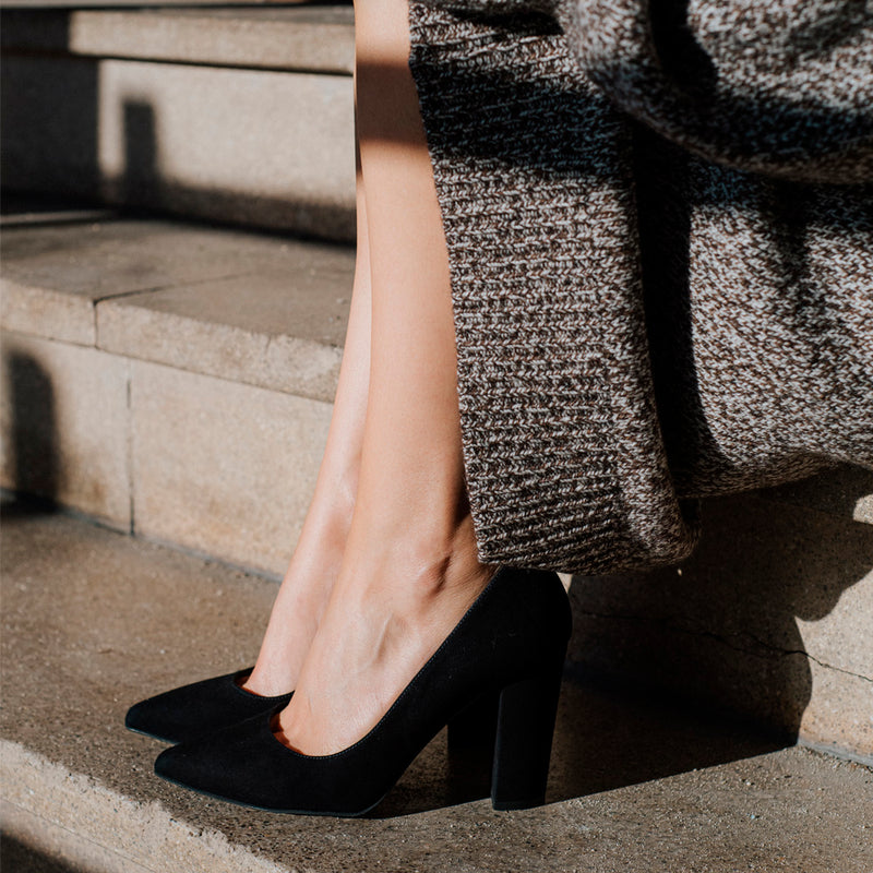 Comfortable black suede stilettos for work.