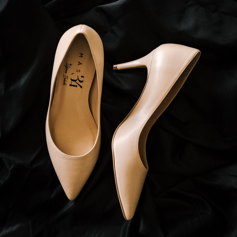 Comfortable and elegant nude leather stilettos are a wardrobe essential