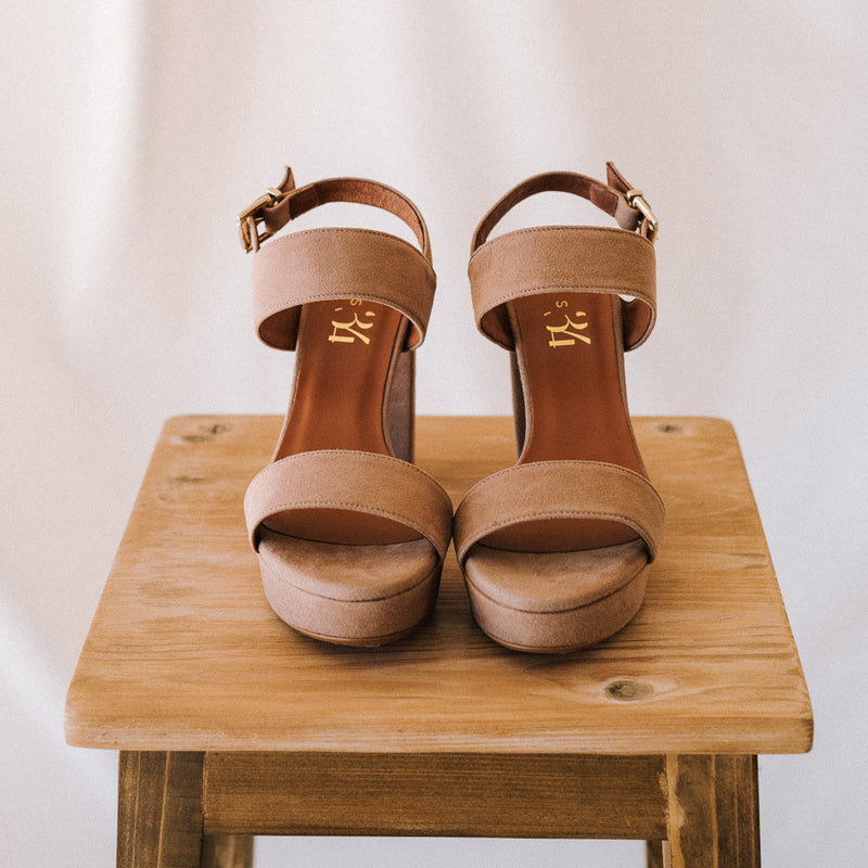 Thick heeled sandals with a very comfortable platform, perfect for all day wear in natural suede.