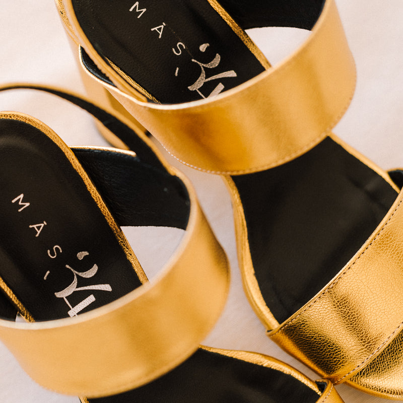 Comfortable high heel sandals in gold leather