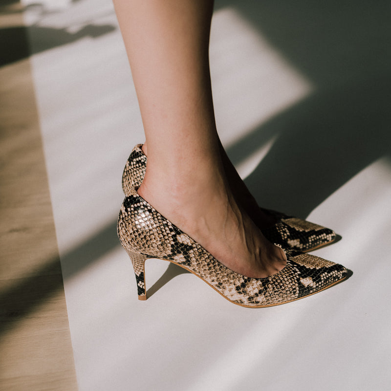 Very comfortable sand colored python print stilettos, perfect to wear all day and all night long.